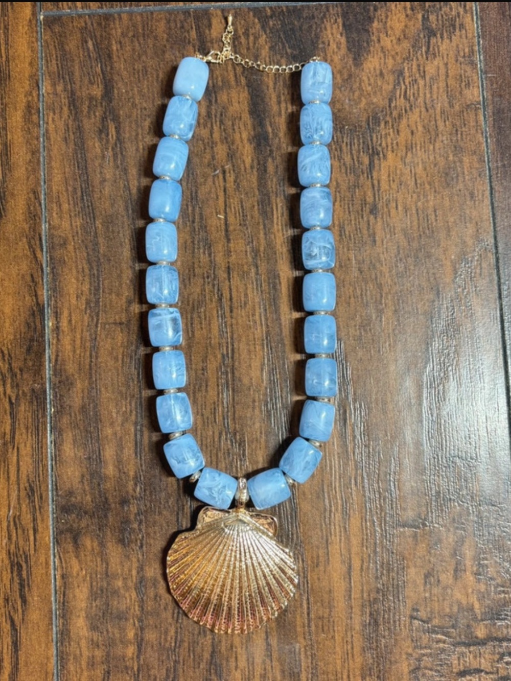 Blue Beaded Necklace with Gold Seashell Pendant
